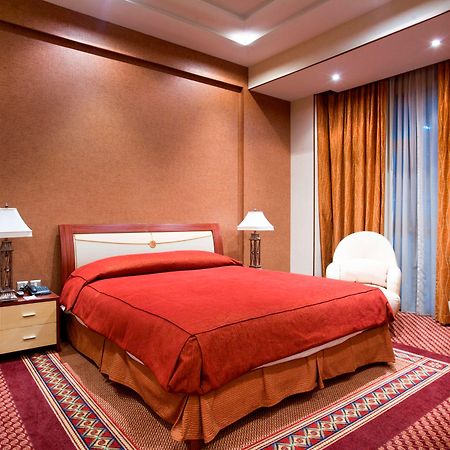 City Center Hotel Manáma Pokoj fotografie