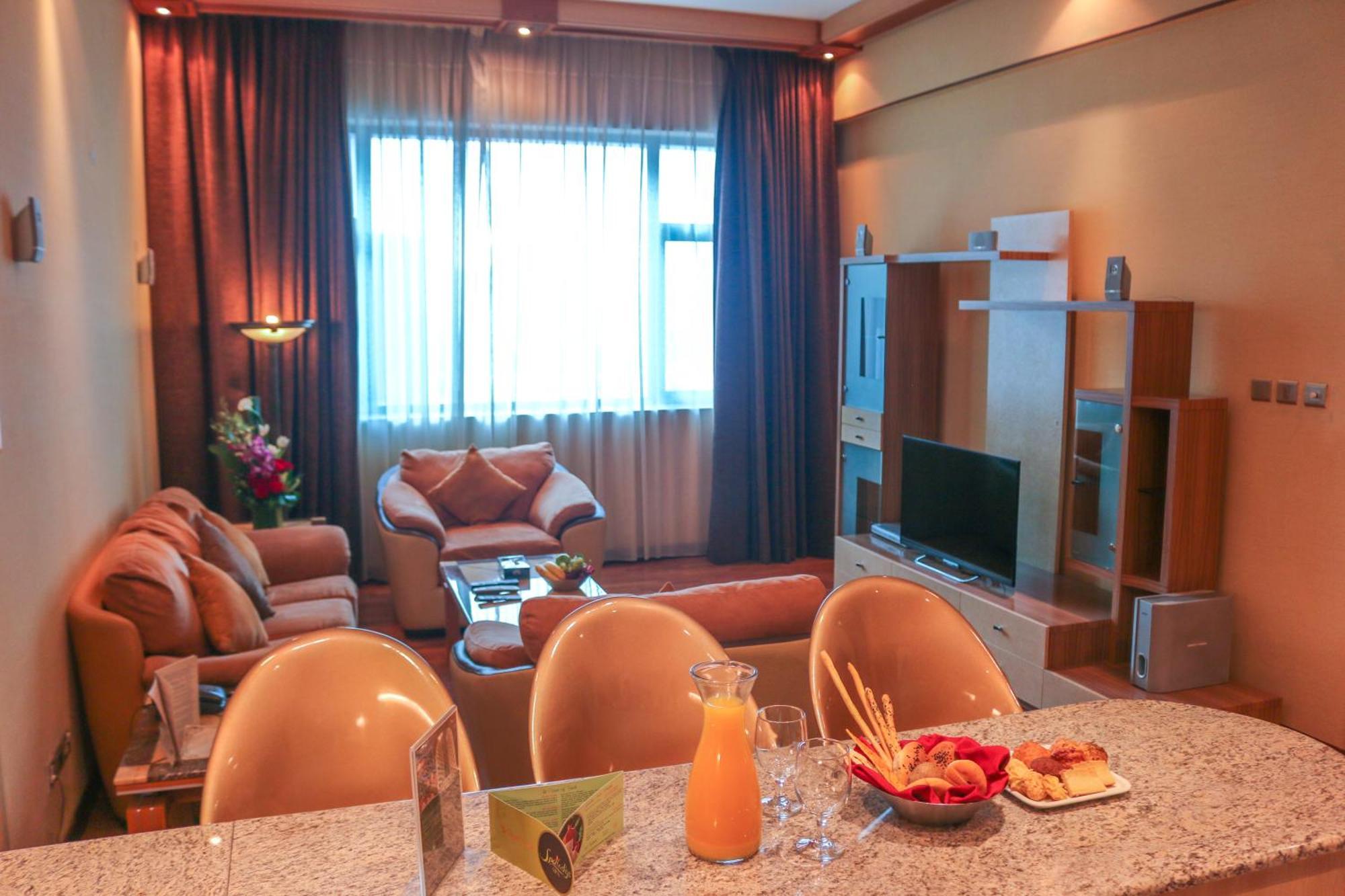 City Center Hotel Manáma Pokoj fotografie